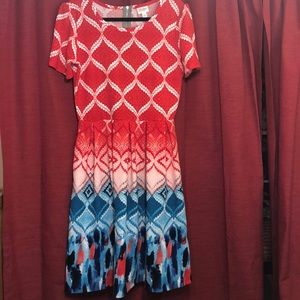 LulaRoe reds, white, blues pattern dress